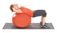 woman crunches with exercise ball