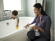 Woman Cleaning Bathroom with Melaleuca
