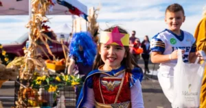 little girl dressed as wonder woman