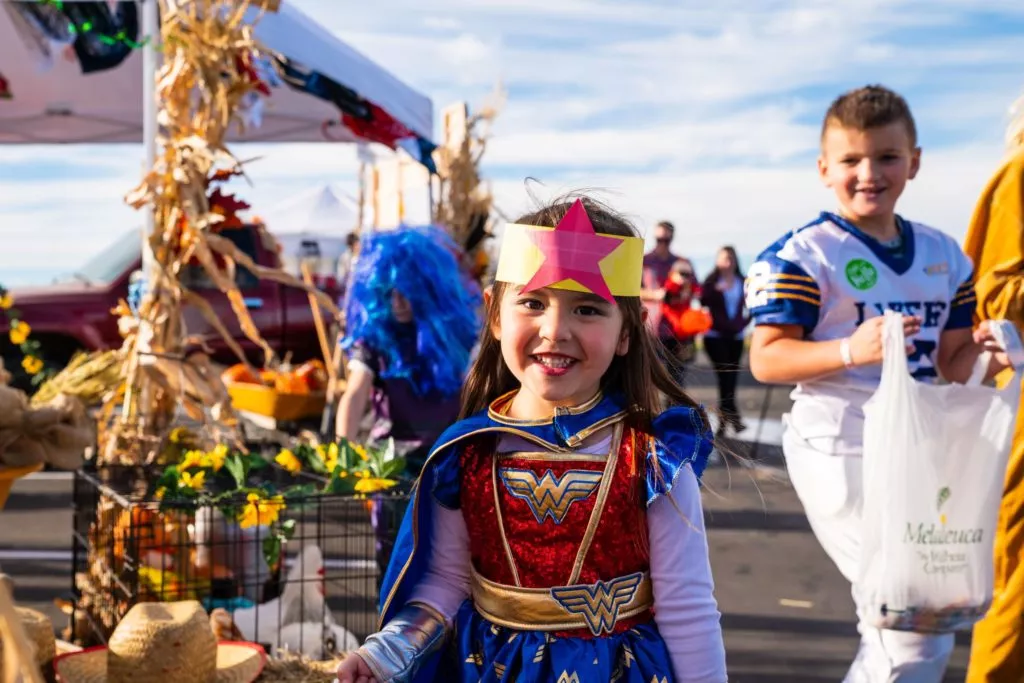 little girl dressed as wonder woman